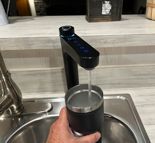 Plumber providing upfront sink and faucet repair pricing